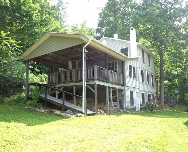 1342 Russell Creek Rd, Lobelville, TN 37097 - view of side of home with a yard, a chimney, stairway, a deck, and view of scattered trees