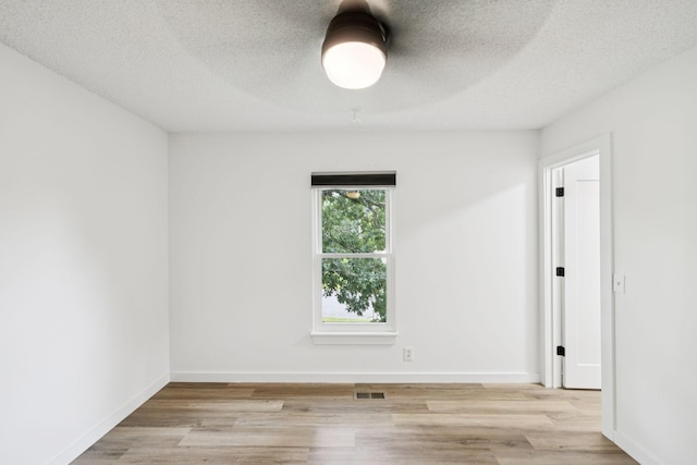 3345 Towneship Rd, Antioch, TN 37013 - spare room with light wood finished floors and a textured ceiling
