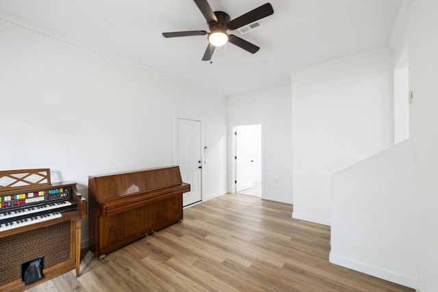 3345 Towneship Rd, Antioch, TN 37013 - empty room with light wood-style flooring, a ceiling fan, and ornamental molding