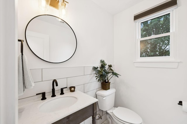 3345 Towneship Rd, Antioch, TN 37013 - bathroom with vanity, tile walls, and decorative backsplash