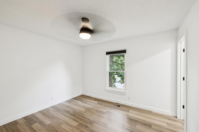 3345 Towneship Rd, Antioch, TN 37013 - unfurnished room featuring wood finished floors and a textured ceiling