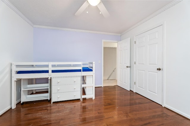 237 Windsor Dr, Cookeville, TN 38506 - unfurnished bedroom featuring crown molding, wood finished floors, and ceiling fan