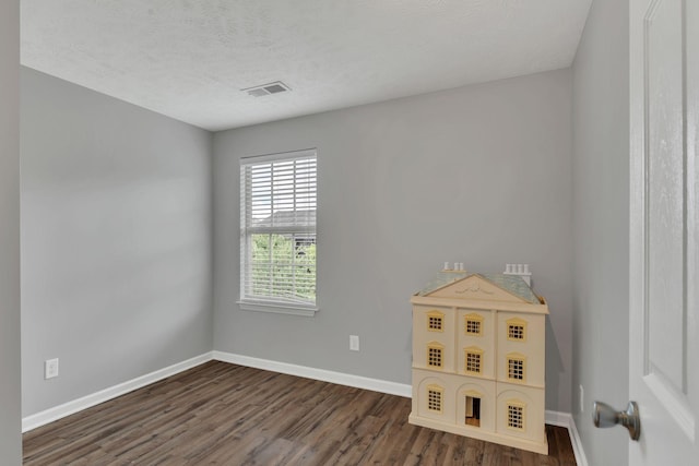 147 N Shadowhaven Way, Hendersonville, TN 37075 - spare room featuring dark wood-style flooring and a textured ceiling