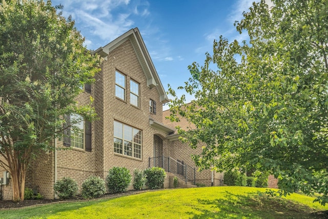147 N Shadowhaven Way, Hendersonville, TN 37075 - view of home's exterior with brick siding and a yard