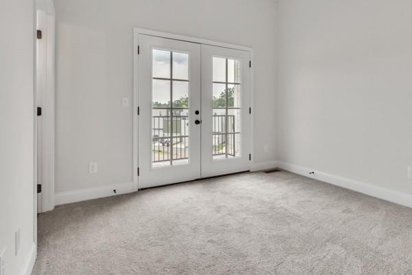 179 Charleston Ave, Pleasant View, TN 37146 - spare room with french doors and carpet