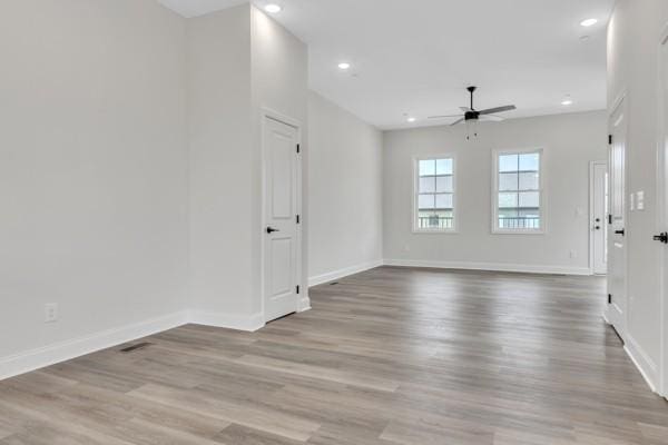 179 Charleston Ave, Pleasant View, TN 37146 - empty room with a ceiling fan, wood finished floors, and recessed lighting