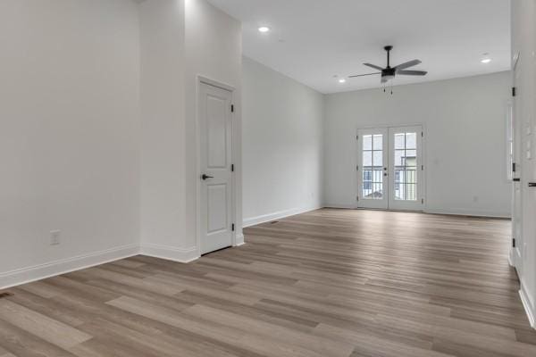 183 Charleston Ave, Pleasant View, TN 37146 - empty room featuring a ceiling fan, light wood finished floors, recessed lighting, and french doors
