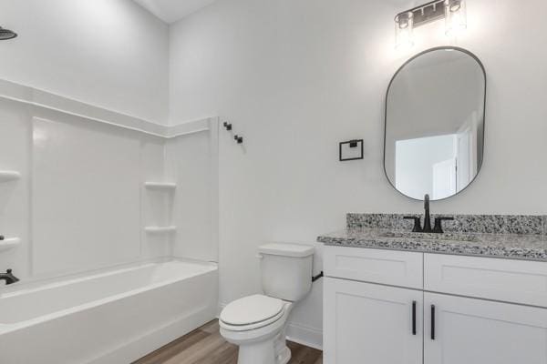 183 Charleston Ave, Pleasant View, TN 37146 - bathroom with wood finished floors, vanity, and  shower combination