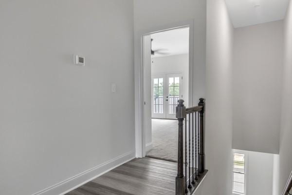 183 Charleston Ave, Pleasant View, TN 37146 - hallway with an upstairs landing and wood finished floors