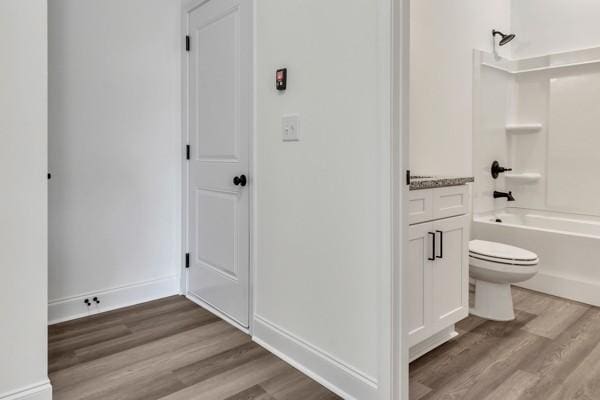 183 Charleston Ave, Pleasant View, TN 37146 - bathroom featuring wood finished floors,  shower combination, and vanity
