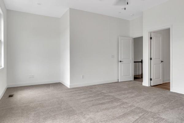 183 Charleston Ave, Pleasant View, TN 37146 - empty room with carpet flooring and a ceiling fan