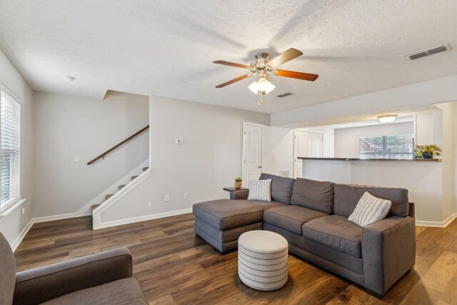 2058 Caladonia Way, Smyrna, TN 37167 - living room with a ceiling fan, wood finished floors, stairway, and a textured ceiling