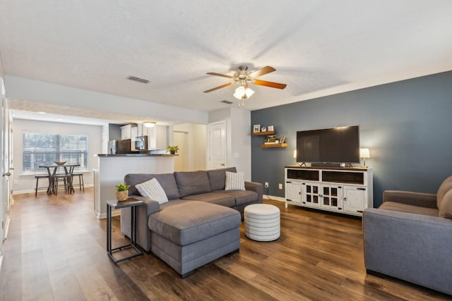 2058 Caladonia Way, Smyrna, TN 37167 - living area with ceiling fan and dark wood-type flooring