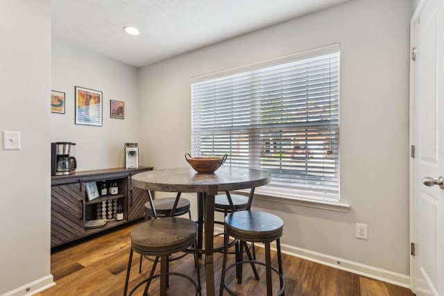 2058 Caladonia Way, Smyrna, TN 37167 - dining space featuring healthy amount of natural light and wood finished floors