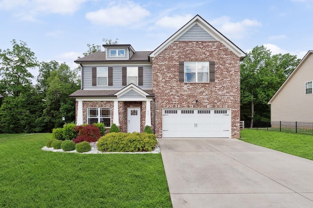 717 Monarchos Bnd, Burns, TN 37029 - view of front facade featuring a garage, brick siding, and concrete driveway