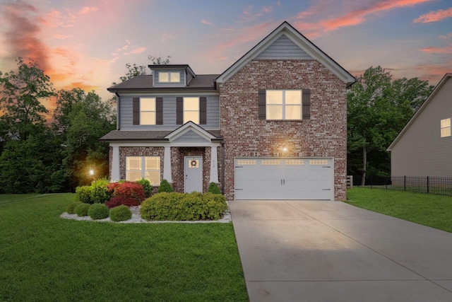 717 Monarchos Bnd, Burns, TN 37029 - view of front of home with brick siding, an attached garage, and driveway