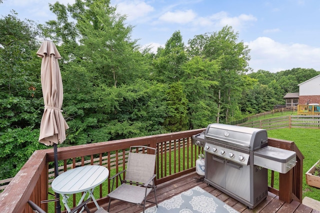 717 Monarchos Bnd, Burns, TN 37029 - wooden terrace featuring a grill