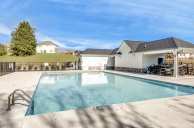 717 Monarchos Bnd, Burns, TN 37029 - community pool with a patio