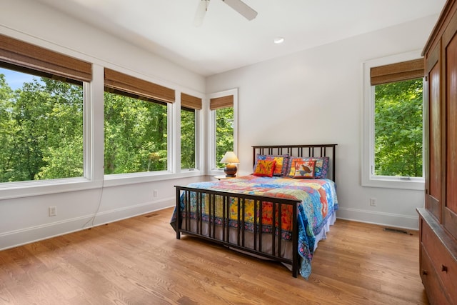 7909 Shoals Branch Rd, Primm Springs, TN 38476 - bedroom with light wood-style floors and ceiling fan