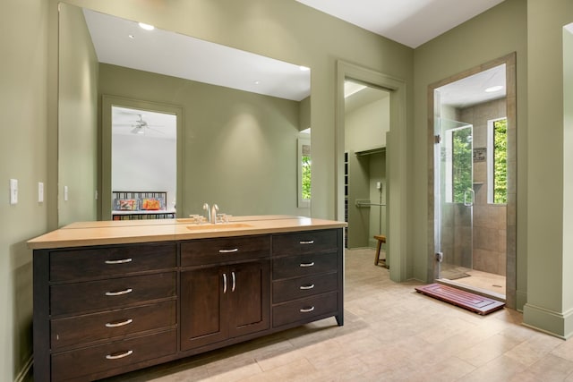 7909 Shoals Branch Rd, Primm Springs, TN 38476 - full bathroom featuring a stall shower, vanity, and a ceiling fan