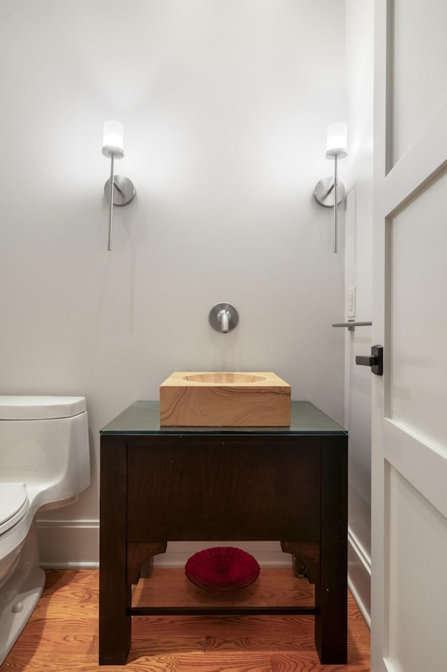 7909 Shoals Branch Rd, Primm Springs, TN 38476 - half bath featuring toilet and wood finished floors