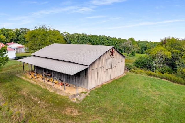 7909 Shoals Branch Rd, Primm Springs, TN 38476 - view of pole building with a carport