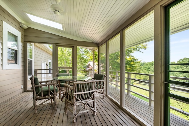 7909 Shoals Branch Rd, Primm Springs, TN 38476 - sunroom / solarium with lofted ceiling, a skylight, and outdoor dining area