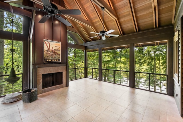 7909 Shoals Branch Rd, Primm Springs, TN 38476 - unfurnished sunroom featuring a tiled fireplace and ceiling fan