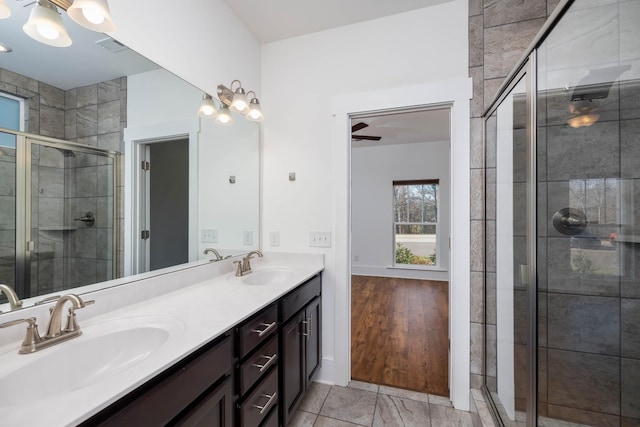 6055 Gracious Dr, Franklin, TN 37064 - bathroom featuring double vanity and a shower stall