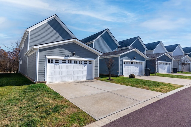 6055 Gracious Dr, Franklin, TN 37064 - view of front facade with concrete driveway, a front lawn, and an attached garage