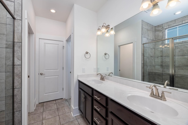 6055 Gracious Dr, Franklin, TN 37064 - full bathroom with double vanity, a shower stall, and tile patterned floors
