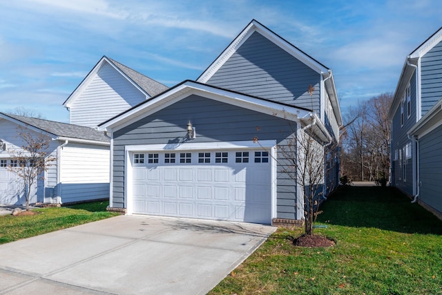 6055 Gracious Dr, Franklin, TN 37064 - view of front of house featuring a garage, driveway, and a front lawn