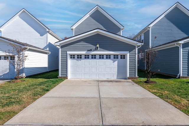 6055 Gracious Dr, Franklin, TN 37064 - traditional home featuring a front lawn, a garage, and concrete driveway