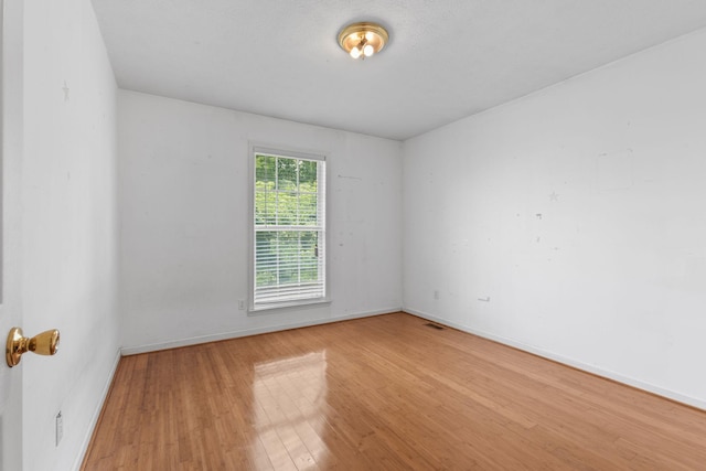 772 Blakemore Rd, Dickson, TN 37055 - spare room featuring wood finished floors and baseboards