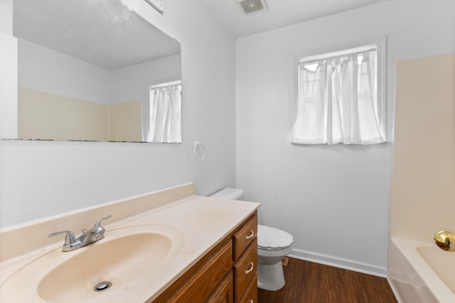 772 Blakemore Rd, Dickson, TN 37055 - full bath with a bath, wood finished floors, vanity, and a shower