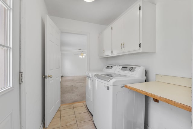 772 Blakemore Rd, Dickson, TN 37055 - laundry area featuring cabinet space, washing machine and clothes dryer, ceiling fan, light tile patterned flooring, and light carpet