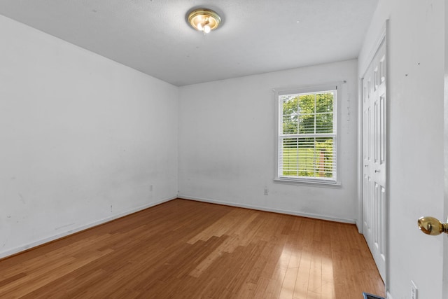 772 Blakemore Rd, Dickson, TN 37055 - spare room with wood finished floors and baseboards