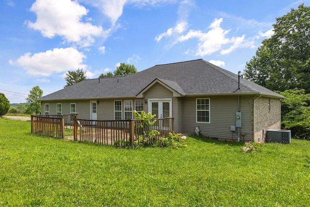 772 Blakemore Rd, Dickson, TN 37055 - back of property featuring a shingled roof, a yard, french doors, and a deck