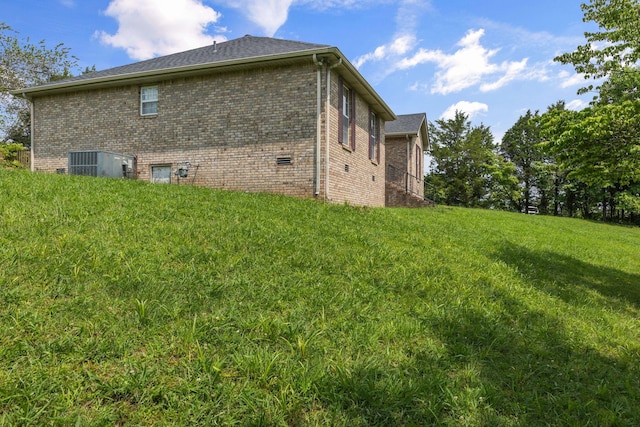 772 Blakemore Rd, Dickson, TN 37055 - view of home's exterior featuring brick siding and a yard