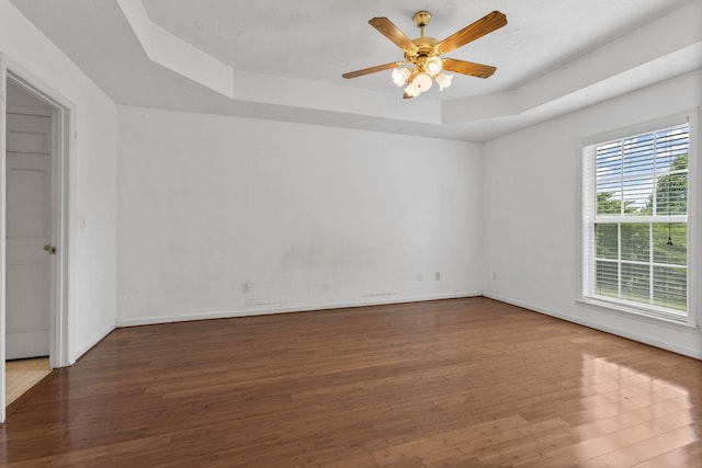 772 Blakemore Rd, Dickson, TN 37055 - empty room featuring a tray ceiling, wood finished floors, and ceiling fan