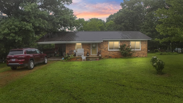 117 Hill Rd, Ardmore, TN 38449 - ranch-style home with brick siding, a front lawn, a carport, and a metal roof