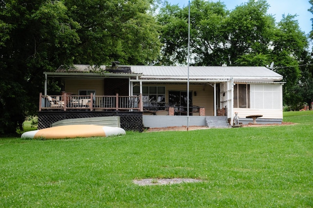 4295 Cairo Bend Rd, Lebanon, TN 37087 - back of house with a yard, a deck, and a metal roof