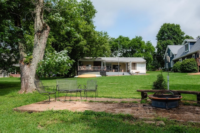 4295 Cairo Bend Rd, Lebanon, TN 37087 - back of property with a lawn and a porch