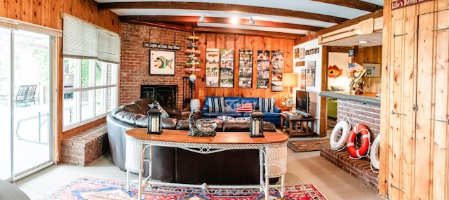 4295 Cairo Bend Rd, Lebanon, TN 37087 - living area with wood walls, a brick fireplace, beamed ceiling, and carpet floors