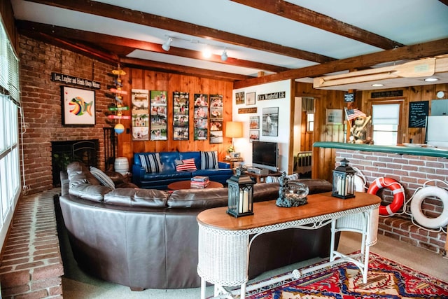 4295 Cairo Bend Rd, Lebanon, TN 37087 - living area featuring wood walls, beamed ceiling, and a brick fireplace