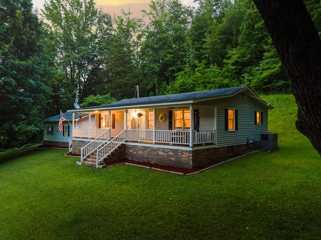 5719 Minor Hill Hwy, Goodspring, TN 38460 - ranch-style house with a porch, crawl space, and a front lawn