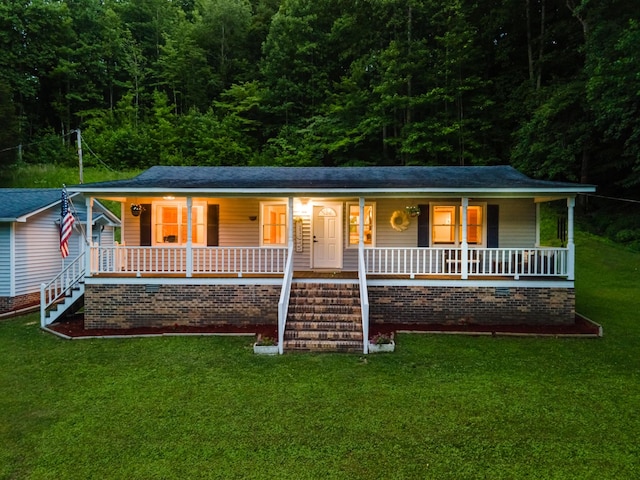 5719 Minor Hill Hwy, Goodspring, TN 38460 - ranch-style house with covered porch, stairs, a front yard, and a forest view