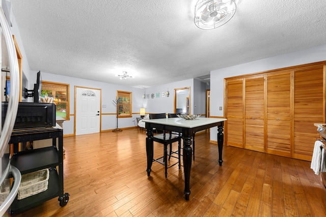 5719 Minor Hill Hwy, Goodspring, TN 38460 - dining area featuring a textured ceiling and hardwood / wood-style flooring