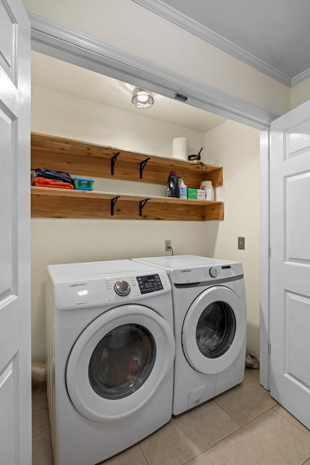 1409 E Northfield Blvd, Murfreesboro, TN 37130 - laundry area with washer and clothes dryer, light tile patterned floors, and crown molding
