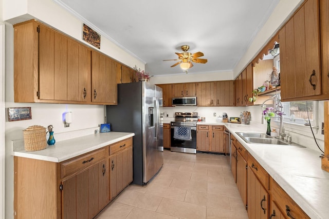 1409 E Northfield Blvd, Murfreesboro, TN 37130 - kitchen featuring stainless steel appliances, light countertops, ceiling fan, light tile patterned flooring, and ornamental molding